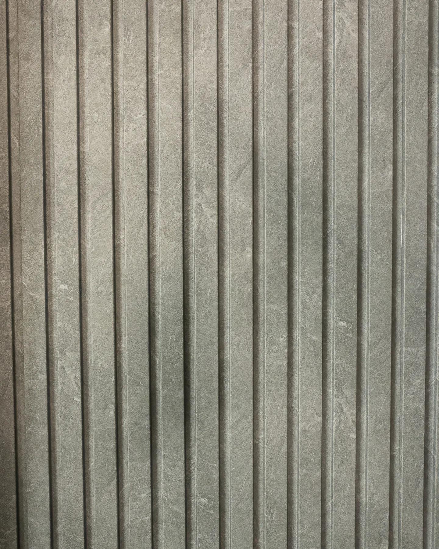 Close-up of the grey fluted wall panel